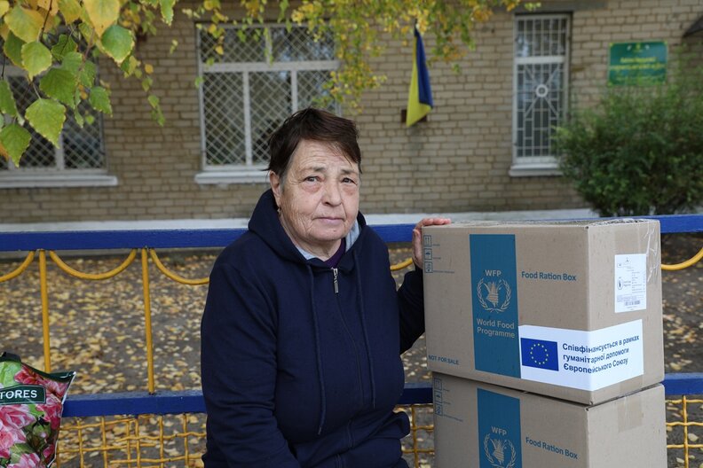 Hanna, 68 y.o. is an IDP who came to Antonivka, where her daughter lives. She now receives food parcels from WFP.  © WFP/Anna Andrusenko