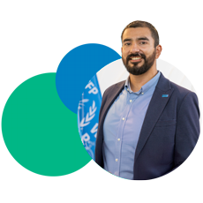 Official portrait of WFP young man employee wearing a dark blue blazer