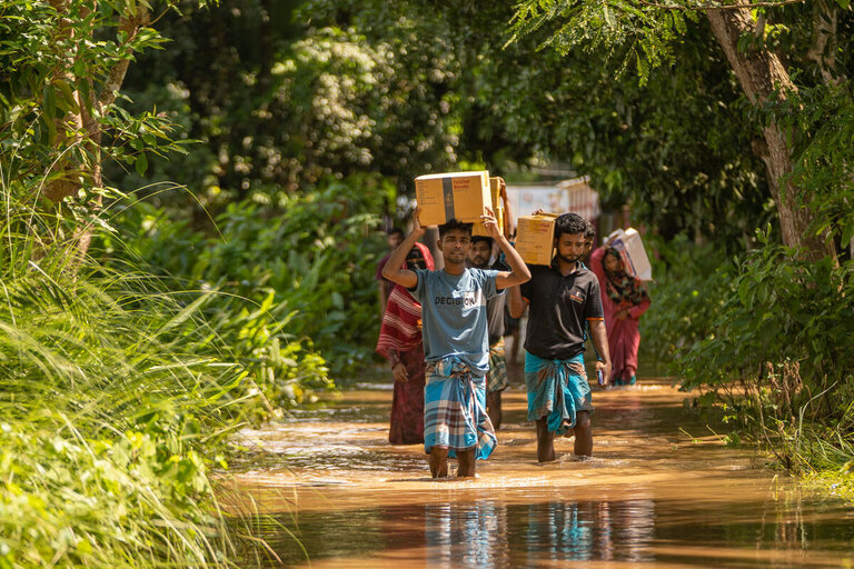 As floods hit dozens of countries, WFP urges investment to protect weather-battered communities