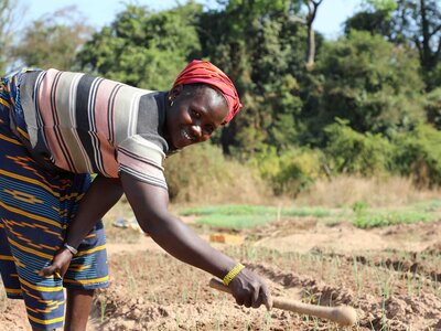 a woman is working in a field