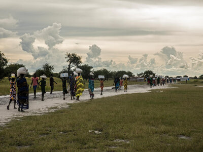Photo: WFP/Gabriela Vivacqua people are walking on a road