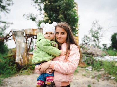 Woman holding a child