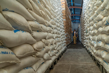 WFP’s Head of Supply Chain in DRC is walking in a warehouse