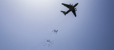  A WFP-chartered Illyushin-76 aircraft drops food commodities into Jiech, Ayod county. WFP uses airdrops as a last resort to deliver critical supplies where there are no viable surface transport options.