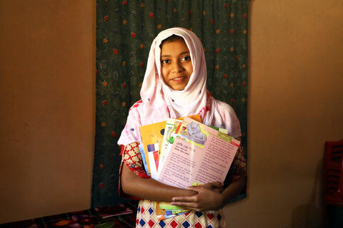 A young student in Bangladesh reads her way to success