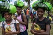 Schoolgirls in Beira, Mozambique, taking home rations before schools closed in April. Photo: Karel Prinsloo/Arete/UN Mozambique