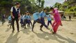 Nepal school kids play football with WFP staffer