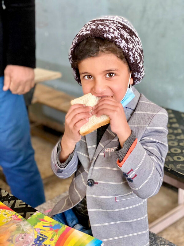 -	WFP/Heyad Musa Children in Qadissiya received school meals during the academic year, before the school closures due to COVID-19.