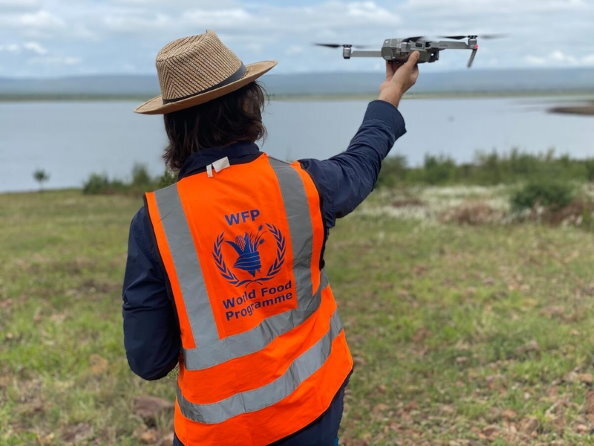 The UN agency started building drone capacity in 2017 (training pictured, Mozambique, December 2020). In 2019, following Cyclone Idai in Mozambique, it deployed drones for the first time in an emergency response to conduct rapid post-disaster assessments as well as coordinate with national officials and partners on the ground. WFP/INGC/Antonio Jose Beleza The UN agency started building drone capacity in 2017 (training pictured, Mozambique, December 2020). In 2019, following Cyclone Idai in Mozambique, it deployed drones for the first time in an emergency response to conduct rapid post-disaster assessments as well as coordinate with national officials and partners on the ground. WFP/INGC/Antonio Jose Beleza