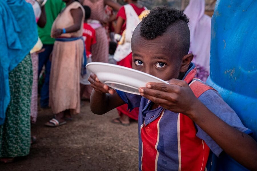 a boy is drinking