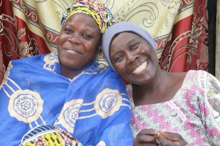 two women are sitting next to each other