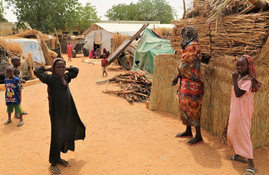 Children who were internally displaced in Geneina town in January play outside of their makeshift shelters, which are set up outside of the Ministry of Welfare. More than 100,000 people are displaced inside of Geneina and are staying at 90 gathering points within the city.