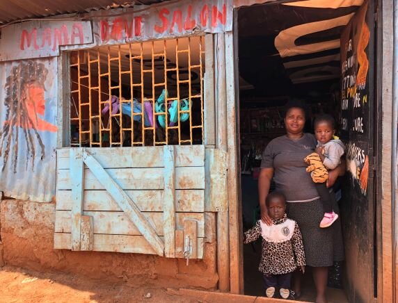 Mary Wanjiku, who received four cash transfers from WFP, is a beautician in Kibagare village in Nairobi. Photo: WFP/Martin Karimi