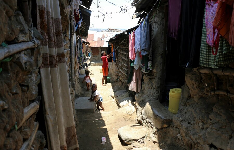 The narrow alleyways of Moroto Simitini twist and turn down the slope snaking between closely packed tin shacks. Photo: WFP/Martin Karimi