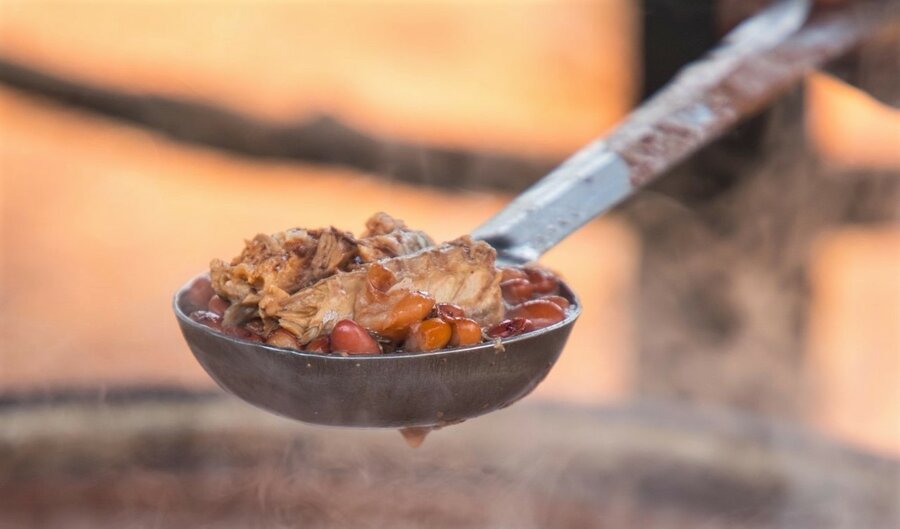 “I like the food we eat at school because it tastes better. But I love more fish with beans” says Hamidal. Photo: WFP/Aurore Ishimwe