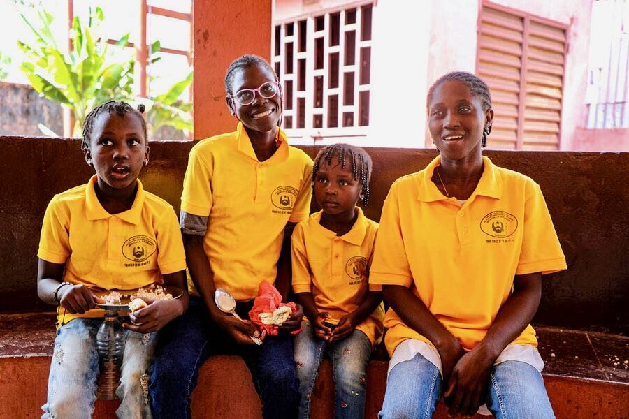 Children enjoy a WFP meal at Bengala Brenca in Bissau. A World Bank study found good education is key for kids with disabilities who face major barriers. WFP/Richard Mbouet