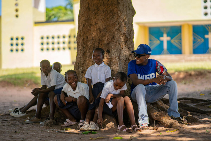 Innoss'B under a tree in a playground