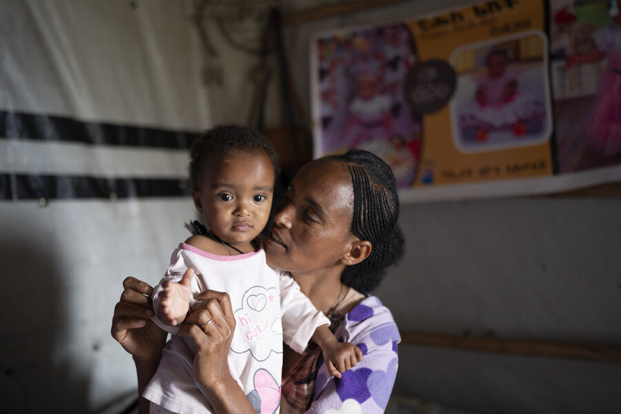 A mother in Ethiopia holds her 1-year-old daughter