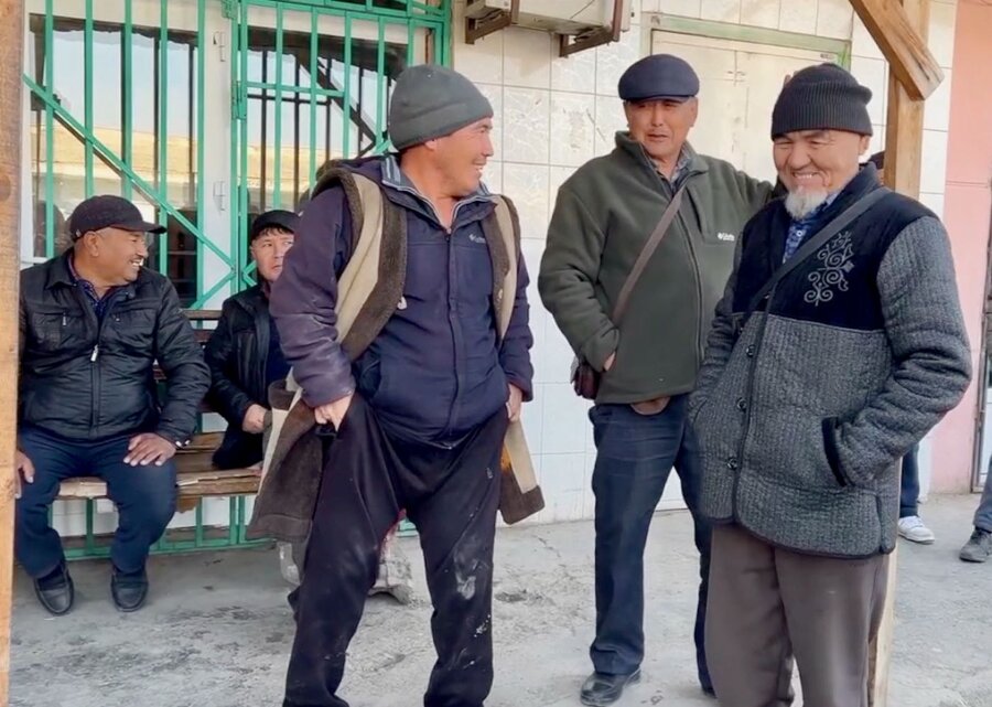 Sarybai (L) and fellow taxi drivers ensure there's enough work for all of them. Photo: WFP/Giulio d'Adamo.jpg