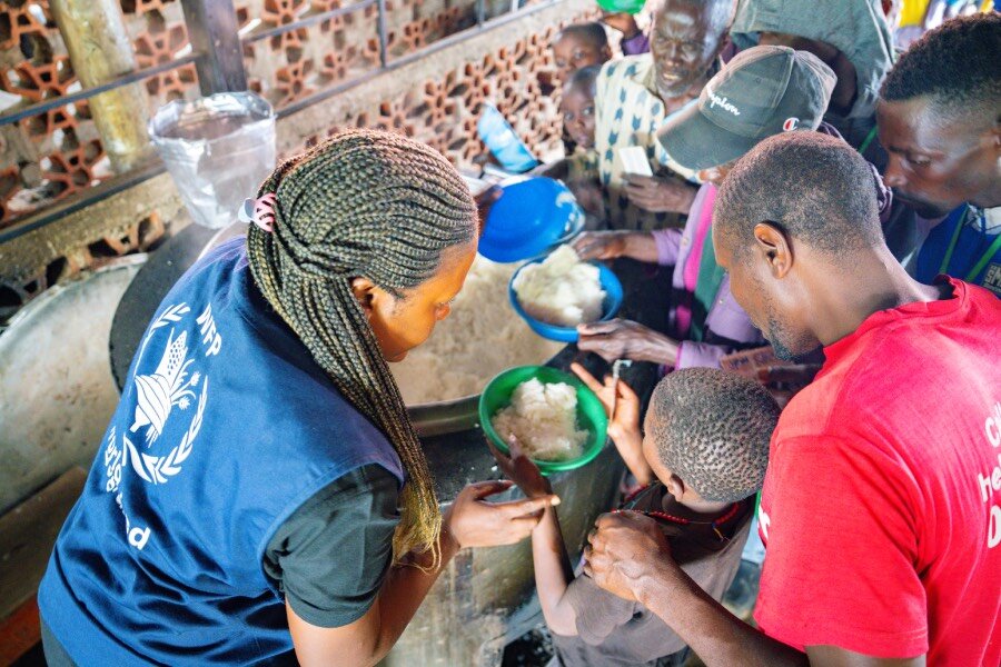 Congolese refugees pack a sports stadium in Rugombo, northwestern Burundi. In Burundi and Uganda, welcome spaces for the newcomers are overflowing. WFP/Colombe Ishimwe