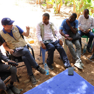 WFP, FAO and local government representatives meet in crisis-affected Baardheere, Somalia. WFP/Petroc Wilton  