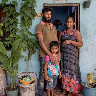  Sri Lanka. M. N. Keshala, 26, and six-months pregnant, at her tiny home she shares with her son and husband. Photo credit: WFP/Josh Estey