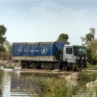 WFP truck delivering food items and other relief supplies to remote communities in Sudan